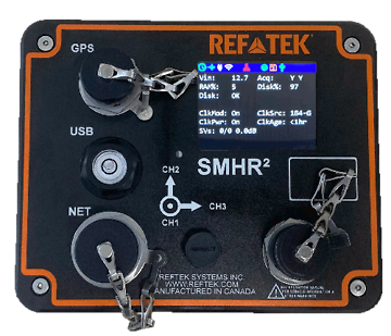 Fig 1 - Image of the SMHR² Integrated Seismic Recorder and Accelerometer depicting the ports and data screen, includes 3 adjustable feet for levelling. (Image courteously provided by Reftek)